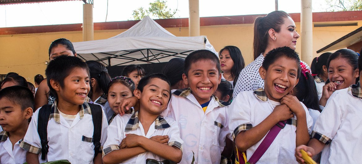 Children in schools in Sierra Gorda, Queretaro, Mexico, learn to respect the environment in a classroom while enjoying some locally produced foods.